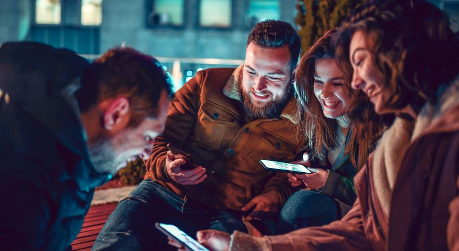 Young people looking at phones