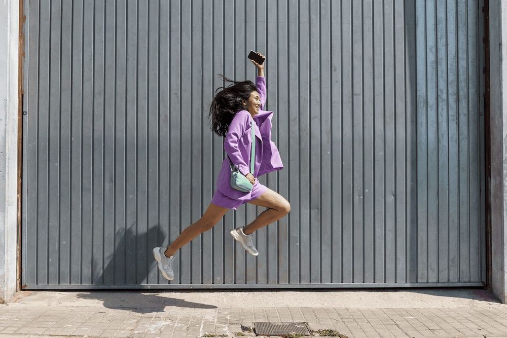 Woman leaping for joy