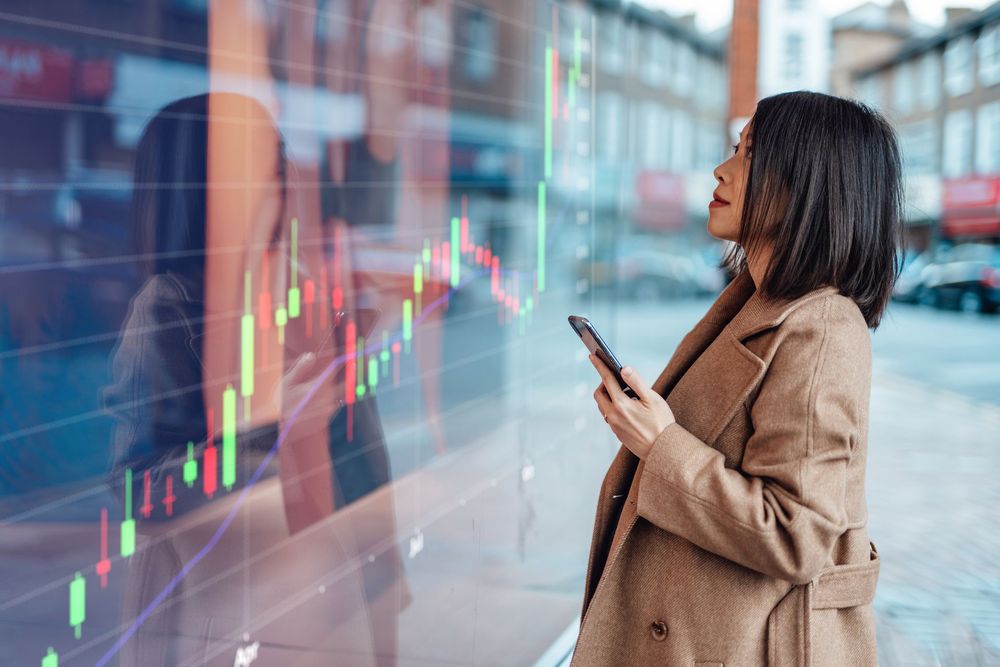 Woman looking at market fluctuations
