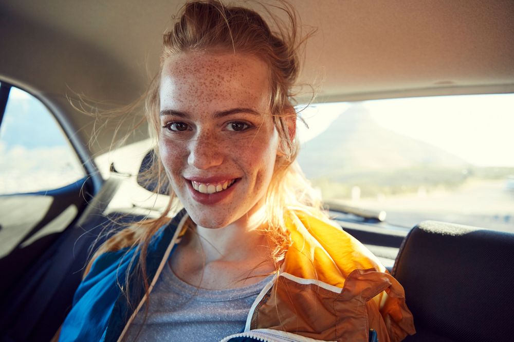 Woman travelling in car 