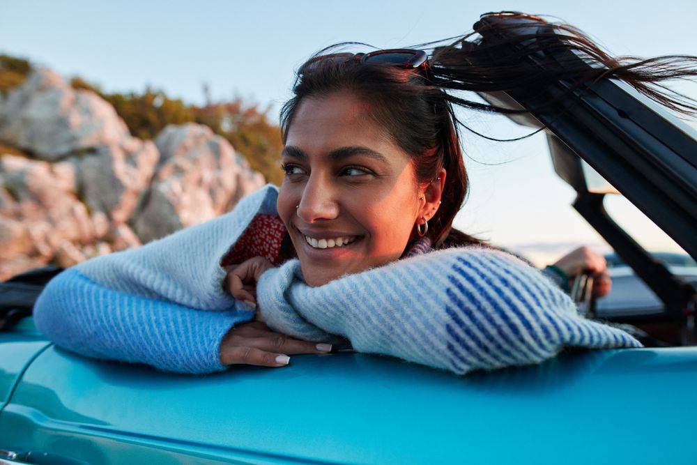 Young woman travelling in car 